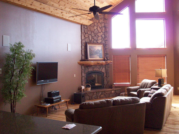 living room, vaulted ceiling, fireplace